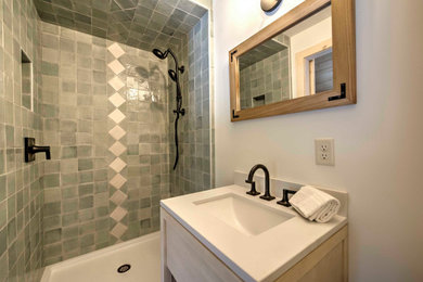 Alcove shower - small green tile single-sink alcove shower idea in Other with an undermount sink, white countertops, a niche and a freestanding vanity