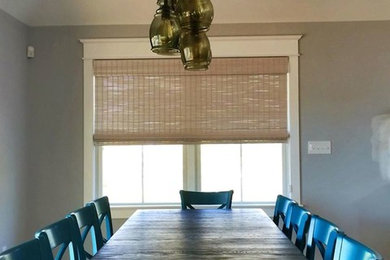 Enclosed dining room - large traditional medium tone wood floor enclosed dining room idea in Philadelphia with gray walls