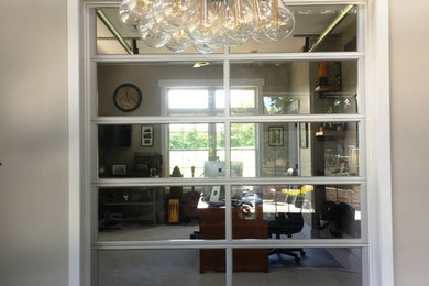 Example of a mid-sized urban freestanding desk carpeted and gray floor study room design in Other with gray walls