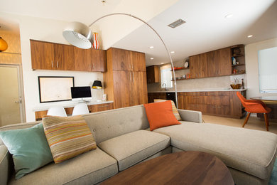 Mid-century modern living room photo in Los Angeles