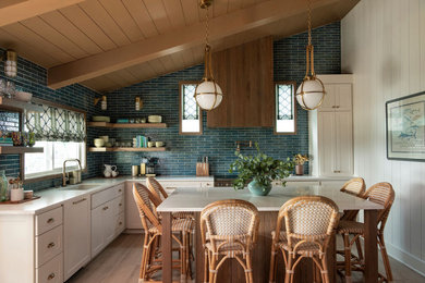 Example of a beach style kitchen design in Houston