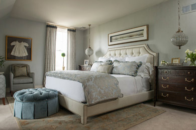 This is an example of a traditional master bedroom in Other.