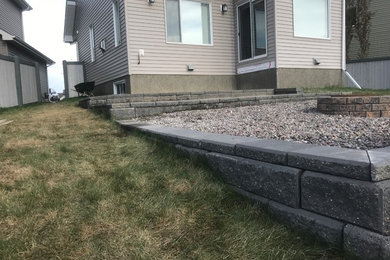 Example of a minimalist home design design in Edmonton