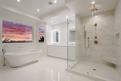 Large contemporary master bathroom in Los Angeles with flat-panel cabinets, white cabinets, a freestanding tub, a corner shower, gray tile, white tile, marble, white walls, an undermount sink, engineered quartz benchtops, white floor, an open shower and white benchtops.