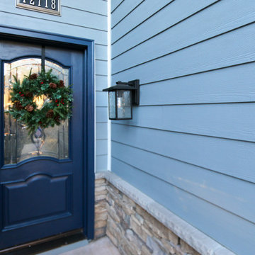 Home Exterior Remodel with Hardie Siding and Blue Front Door