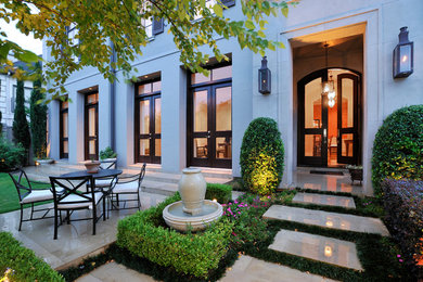 Inspiration for a timeless entryway remodel in Houston with a glass front door