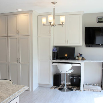 Alpha, IL White and Gray Kitchen with Hidden Laundry and Raised Dishwasher