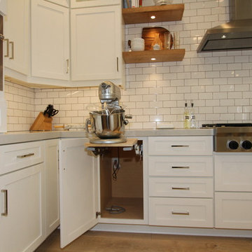 White Kitchen with Floating Wall Shelves & fireplace