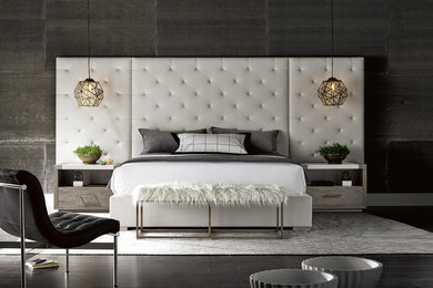 Minimalist dark wood floor and black floor bedroom photo in Houston with gray walls