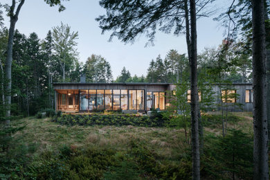 Inspiration for a contemporary one-story house exterior remodel in Portland Maine