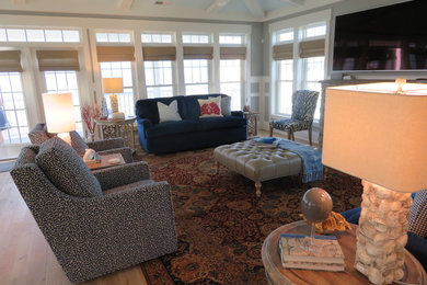 Living room - huge coastal open concept living room idea in Wilmington