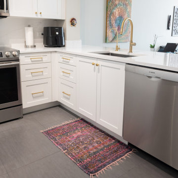 Contemporary Kitchen Remodel Done in a Painted White Shaker Door