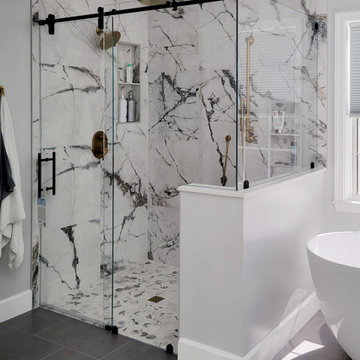Rolling Shower Door in Modern Bathroom with Freestanding Soaking Tub