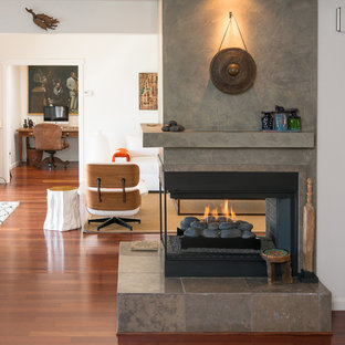 Inspiration för moderna vardagsrum, med en dubbelsidig öppen spis