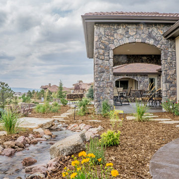 Traditional Exteriors Featuring Stone