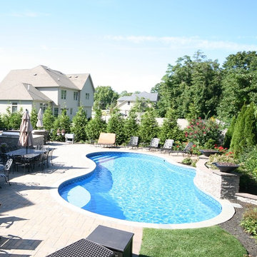 Custom swimming pool with water feature