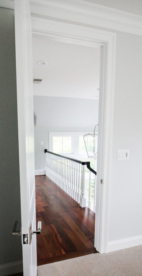 Powerful Impression by Floating Staircase in Suburban Foyer