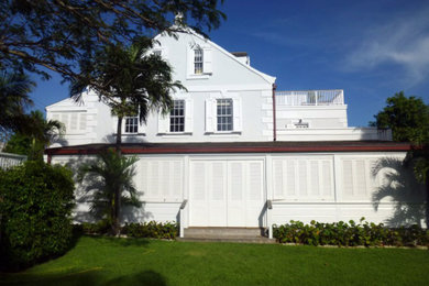 Example of an island style exterior home design in Other