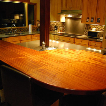 Unique Shape for an African Mahogany Raised Eating Bar