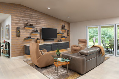 Inspiration for a small contemporary open concept living room in Orange County with light hardwood floors, a wall-mounted tv and beige floor.