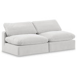 Meridian Furniture - Comfy Upholstered Modular Sofa, Cream, 2-Piece: 2 Armless Chair, Velvet - Give your space a whole new look with this cream Comfy velvet sofa. This handsome sofa fits nicely with other items in the Comfy collection and is a versatile seating option designed for adaptability, comfort and style. Wrapped in rich cream durable velvet upholstery, this sofa offers a plush embrace of overstuffed down feather cushions, carefully crafted to deliver the highest level of comfort. The perfect seat for creating an oasis for relaxation, this sofa has thick foam surrounding its frame for added support and coziness.