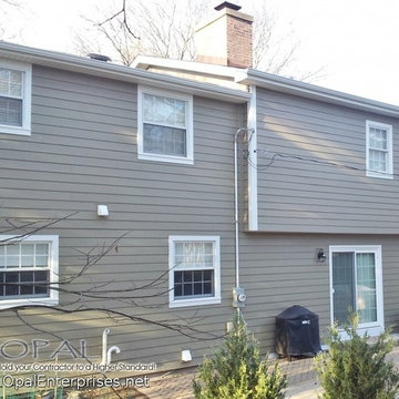 Back View with Woodstock Brown Hardie Siding, White Trim & Alside Gutters
