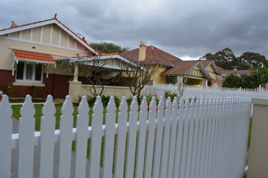 Photo of a traditional home design in Perth.