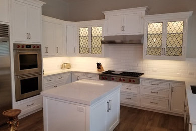 This is an example of a kitchen in Los Angeles with multiple islands.