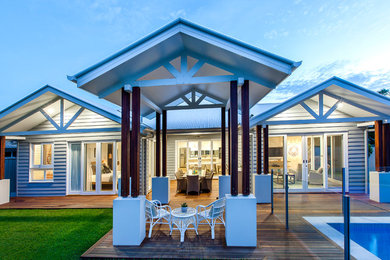 Photo of a small beach style home design in Brisbane.