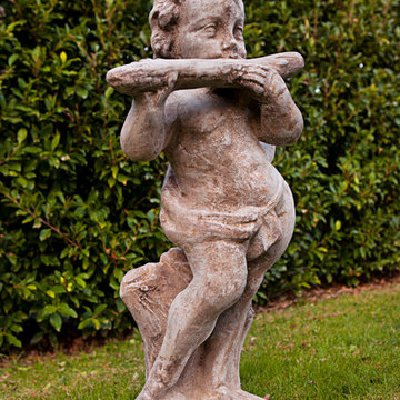 Cherub Flutist Statue