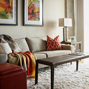 Esempio di un piccolo soggiorno design aperto con pareti bianche, pavimento in bambù, nessun camino e nessuna TV