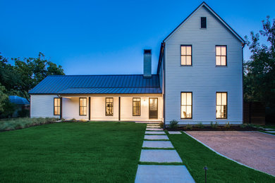Inspiration for a country exterior home remodel in Dallas