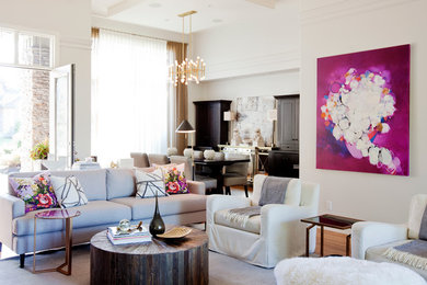 Example of a mid-sized trendy formal and open concept medium tone wood floor living room design in Vancouver with white walls, a standard fireplace and a stone fireplace