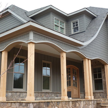 Stone, shake, arches, columns, board and batten