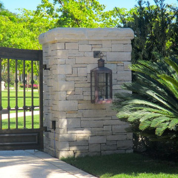 Stone pillar and driveway gate