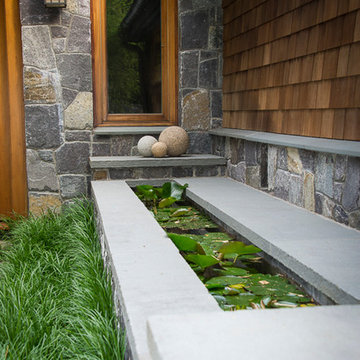Rill, water lilies, Liriope & granite spheres