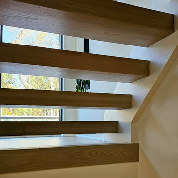 Project #111 | Open-Riser Staircase with Glass Panel Detail