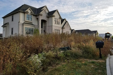 Design ideas for a large contemporary landscaping in Milwaukee.