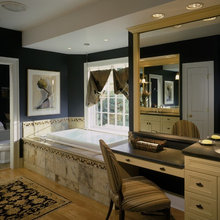 Navy walls with gold/brass accents.