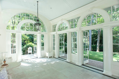 This is an example of a traditional sunroom in Dallas.