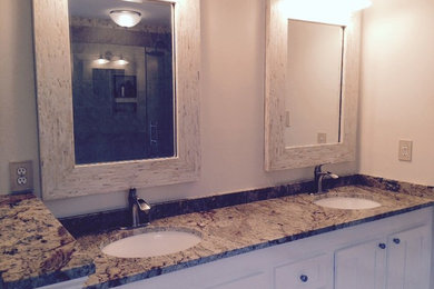 Mid-sized elegant master beige tile and ceramic tile ceramic tile bathroom photo in Richmond with an undermount sink, recessed-panel cabinets, white cabinets, granite countertops, a one-piece toilet and beige walls