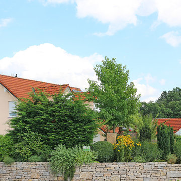 Garten mit Urlaubsflair und Koiteich