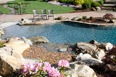 Inspiration for a rustic pool remodel in Other