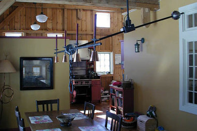 Enclosed dining room - mid-sized farmhouse multicolored floor enclosed dining room idea in Burlington with beige walls