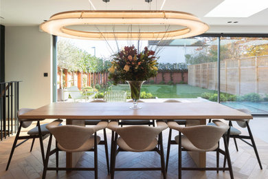 Design ideas for a contemporary dining room in London.