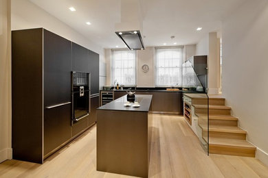 This is an example of a contemporary kitchen in London.