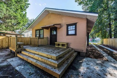 Example of an arts and crafts deck design in Jacksonville