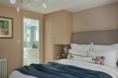 Inspiration for a small bohemian master bedroom in London with pink walls, a coffered ceiling and feature lighting.