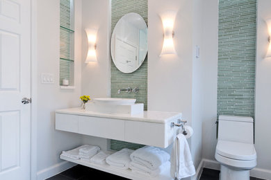Freestanding bathtub - large contemporary master green tile and glass tile porcelain tile freestanding bathtub idea in Other with flat-panel cabinets, white walls, an integrated sink and marble countertops
