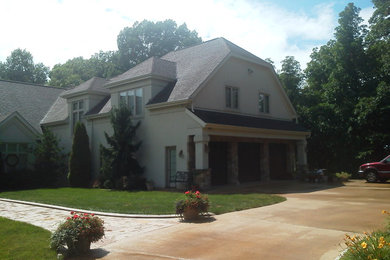 Design ideas for a front yard concrete paver driveway in Other.